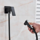Matte black brass bidet faucet with handheld spray for bathroom