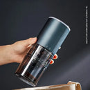Matte dark teal electric coffee bean grinder kitchen machine
