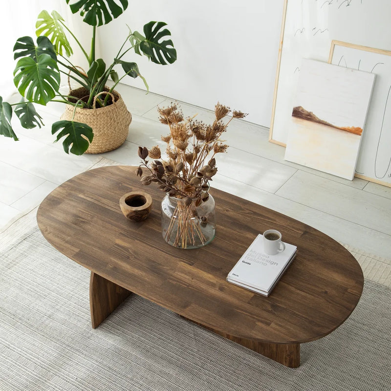 Miami Designer Coffee Table Solid Wood (W)24" (L)48" (H)13.75" walnut vase and decorative items on the table coffee mug and books