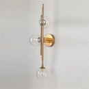 Mid century brass finish 3 light clear glass orb sconce living room