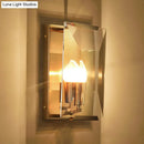 Mid century gold wall sconce with crystal shield for living room