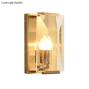 Mid century gold wall sconce with crystal shield for living room