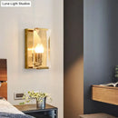 Mid century gold wall sconce with crystal shield for living room