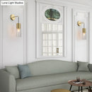 Minimal brass and glass wall sconce light bedroom curved arm lamp