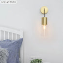 Minimal brass and glass wall sconce light bedroom curved arm lamp