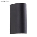Minimalist black aluminum outdoor cylinder wall light outdoor space