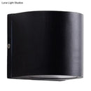 Minimalist black aluminum outdoor cylinder wall light outdoor space