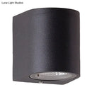 Minimalist black aluminum outdoor cylinder wall light outdoor space
