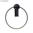 Minimalist black circular metal sconce – living room wall light