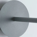Minimalist black flying saucer wall lamp for bedroom decor