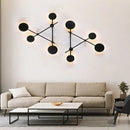 Minimalist black geometric wall light fixture for living room
