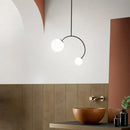 Minimalist black glass ball pendant lights – dining room curved arm