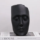 Minimalist black & gold abstract face sculpture living room decor
