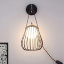 DecorBites™ Minimalist Black LED Wall Sconce with Leather Handle - Pear Cage Iron Design