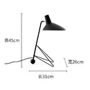 Minimalist black metal tripod desk lamp for bedroom or office
