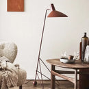 Minimalist black metal tripod desk lamp for bedroom or office