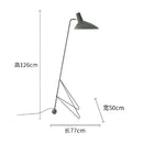 Minimalist black metal tripod desk lamp for bedroom or office