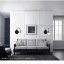 Minimalist black modern wall lamp bedroom curved sconce