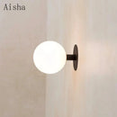 Minimalist black wall lamp with white glass globe bedroom lighting fixture