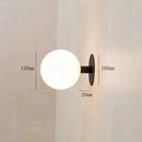 Minimalist black wall lamp with white glass globe bedroom lighting fixture