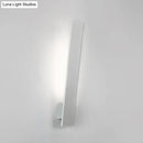 Minimalist black & white aluminum shade direct wired sconce bedroom