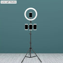 Minimalist black & white mobile phone holder with ring light bedroom
