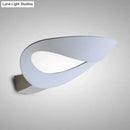 Minimalist black & white oval led wall sconce – bedroom wall light
