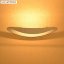 Minimalist black & white oval led wall sconce – bedroom wall light