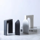 Minimalist black & white semicircular arch bookends living room decor