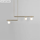 Minimalist brass and white glass ceiling light for kitchen island