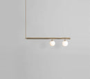 Minimalist brass and white glass ceiling light for kitchen island