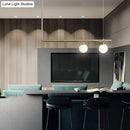 Minimalist brass and white glass ceiling light for kitchen island