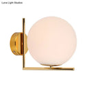 Minimalist brass angle arm opaline glass wall sconce bedroom light