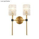 Minimalist brass crystal cylindrical wall sconce living room light