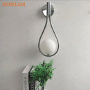 Minimalist brass glass ball wall sconce living room light