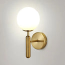 Minimalist brass textured glass globe wall mount light for bedroom