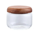 Minimalist clear glass kitchen storage jar with acacia wood lid