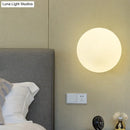 DecorBites™ Minimalist Bedside Sconce Light with White Glass Ball and Gold Wall Mount