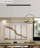 Minimalist gold linear hanging lamp study room bonsai tree design