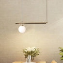 Minimalist golden glass sphere pendant light dining room