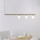 Minimalist golden glass sphere pendant light dining room