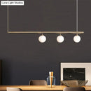 Minimalist golden glass sphere pendant light dining room