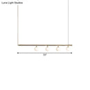 Minimalist golden glass sphere pendant light dining room
