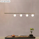 Minimalist golden glass sphere pendant light dining room