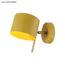 Minimalist pink and brass cylinder wall sconce – corridor light