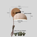 Minimalist pink concrete wall sconce bedroom light with wood backplate