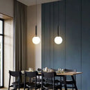 Minimalist white glass ball pendant light – dining room fixture