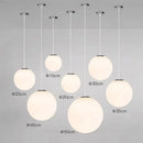 Minimalist white glass ball pendant lights for dining room
