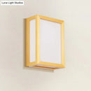 Minimalist white glass wall sconce with wooden frame for corridors