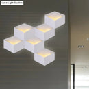 Minimalist white metallic geometric wall mount light for corridor
